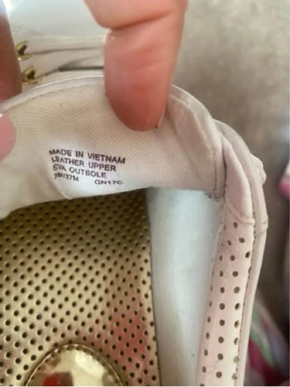 Women’s size 7 Michael Kors Sneakers with Gold Trim